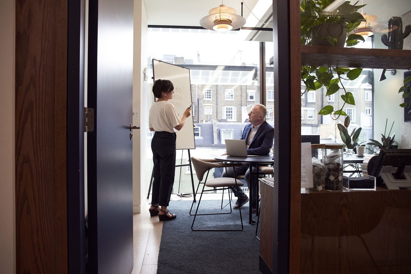 Inova Group colleagues in a meeting room